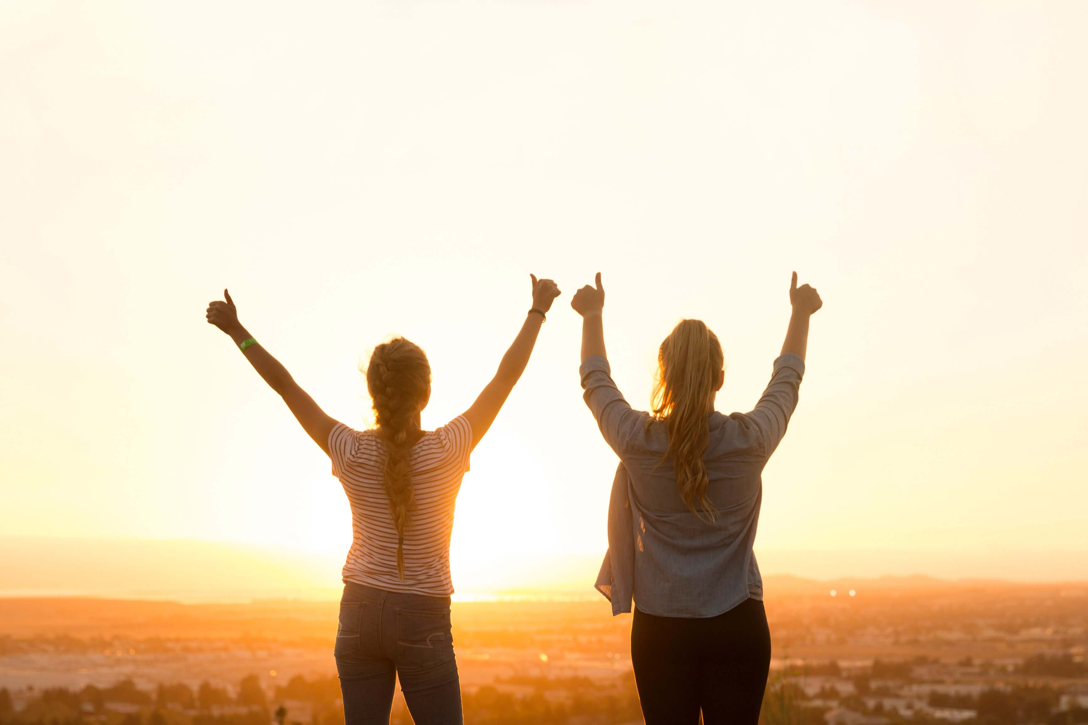 Thumbs up at sun rise