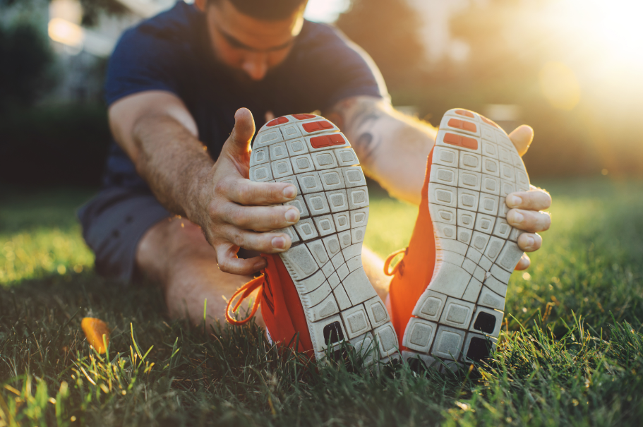 sports-injury-fix-blog-static-stretching-man-sitting-stretching-legs